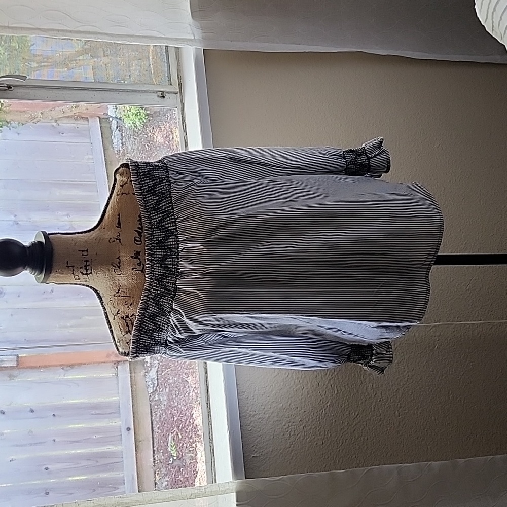 Very cute off the shoulders blouse
